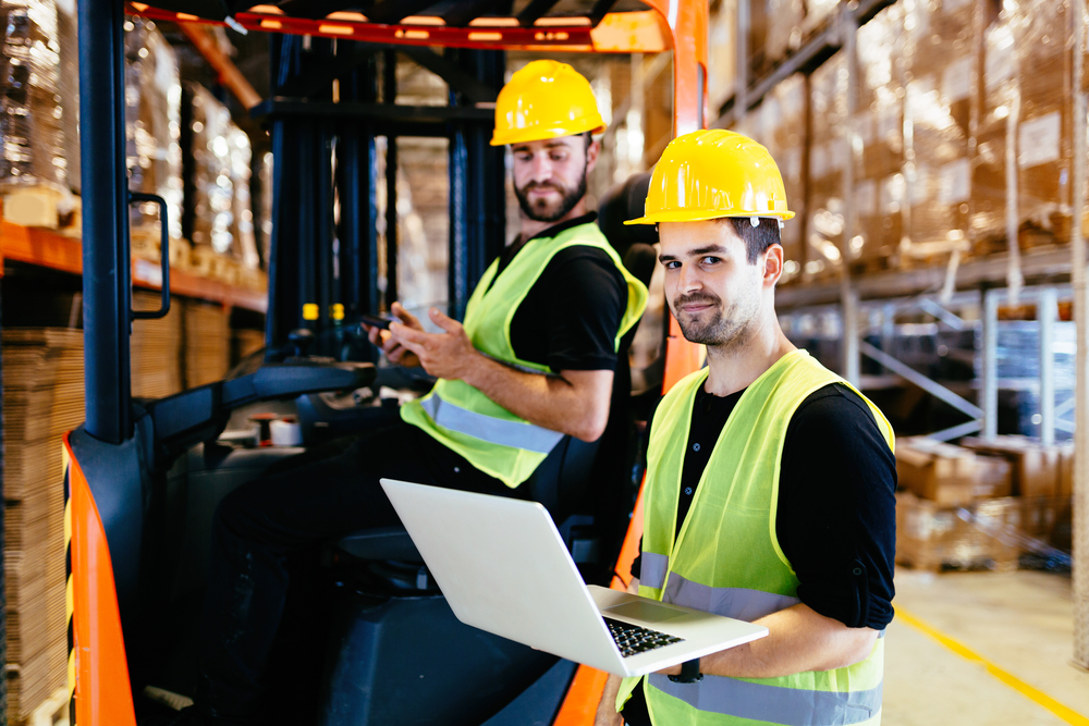Logistics people working in warehouse